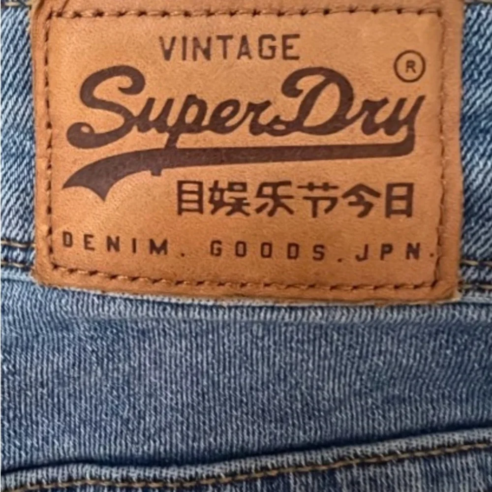 Superdry Vintage Blue Jeans & Red Logo Stripe Studs Blue Stripe Size W27 L30 EUC - Picture 5 of 12